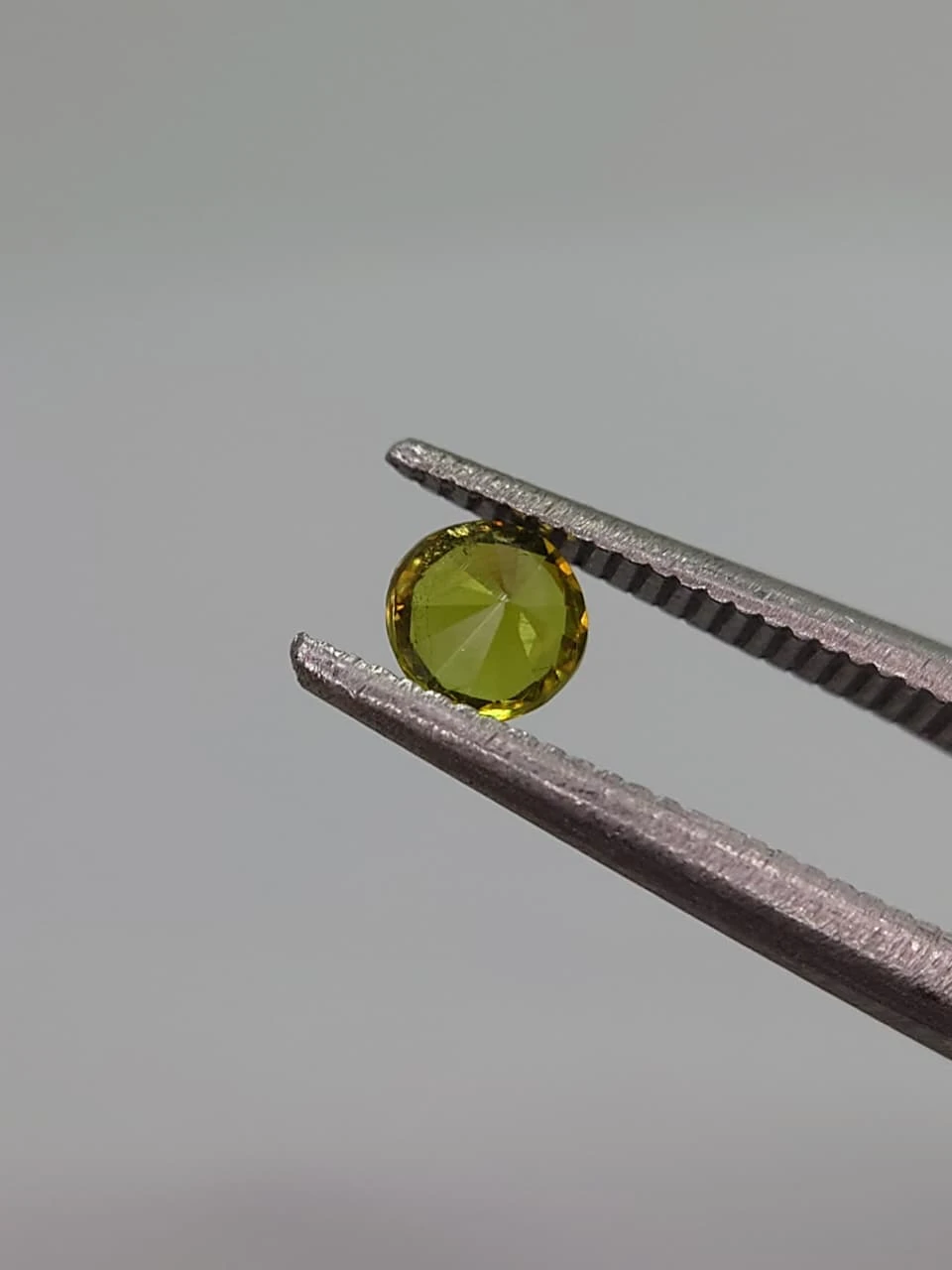 0.3ct Round Faceted Demantoid Garnet from Pakistan — view 2